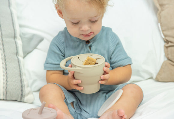 Collapsible toddler snack cup with lid. Toddler snack cup. Toddler silicone snack cup.  Toddler feeding essentials. Toddler travel sized snack cup.