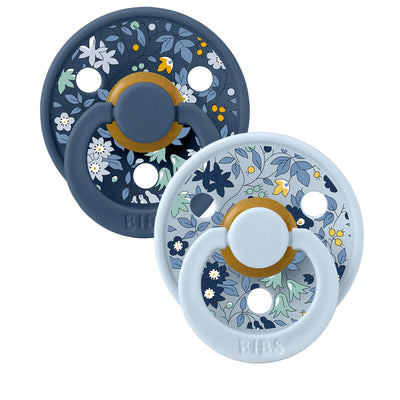 BIBS x LIBERTY Chamomile Lawn pacifier in baby blue floral print with natural rubber nipple.