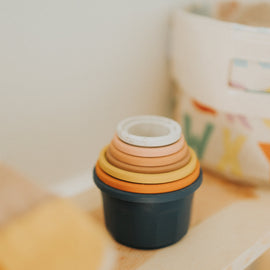 silicone stacking cups shown nested together for storage