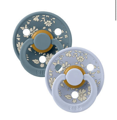 Dusty blue and petrol Capel floral pacifier 2-pack with lightweight shield and natural rubber nipple.