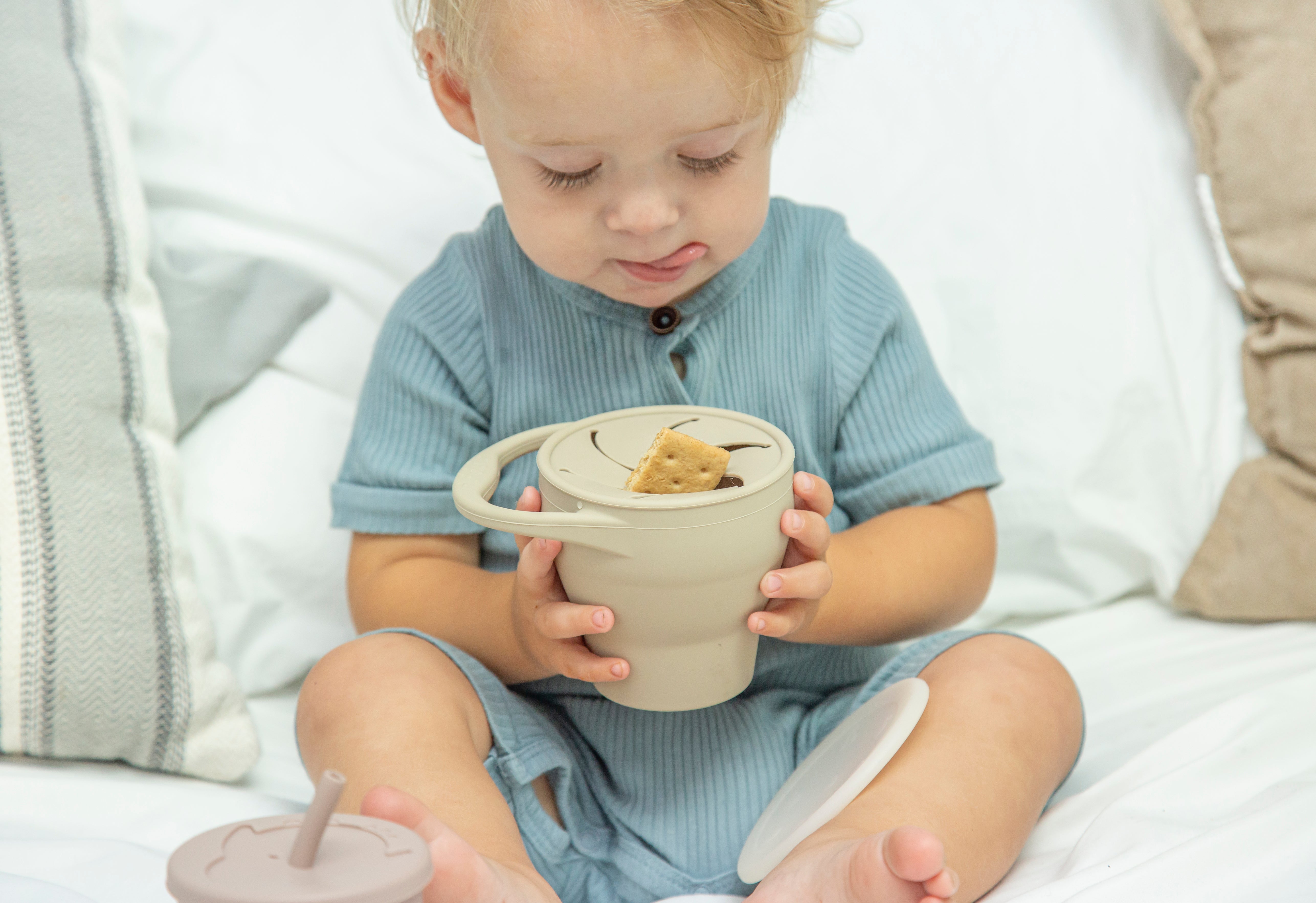 Collapsible toddler snack cup with lid. Toddler snack cup. Toddler silicone snack cup.  Toddler feeding essentials. Toddler travel sized snack cup. 