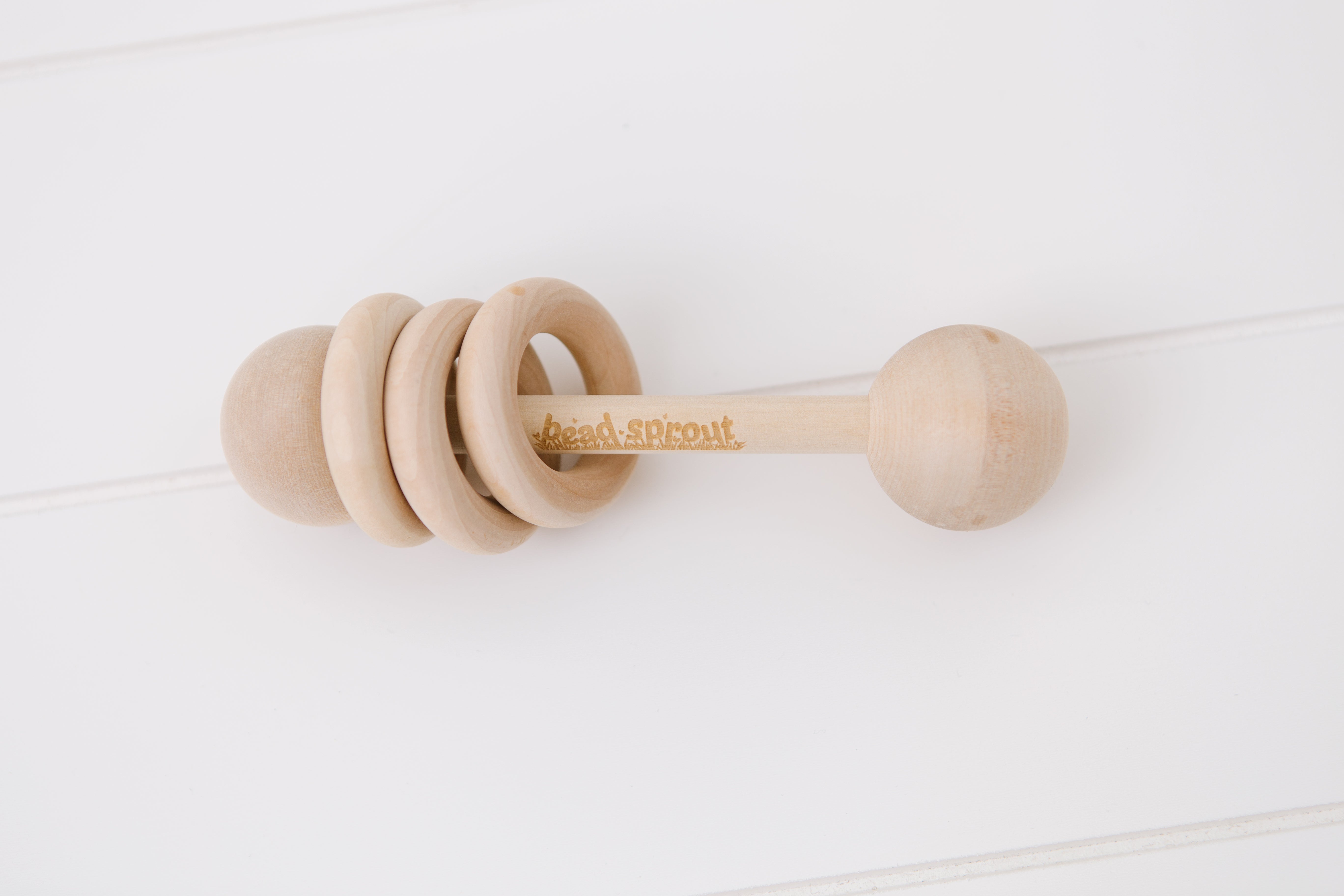 Wooden baby rattle with wood rings, Bead Sprout